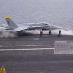 Garett Merk on flight deck of CVN 72